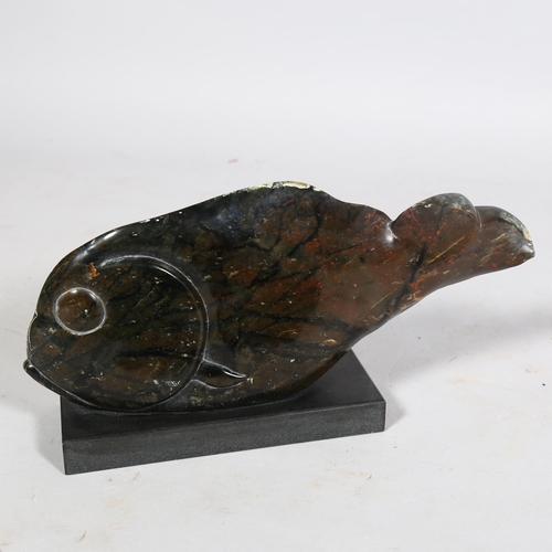 400 - A carved and polished green/black marble fish on black granite base, length 41cm