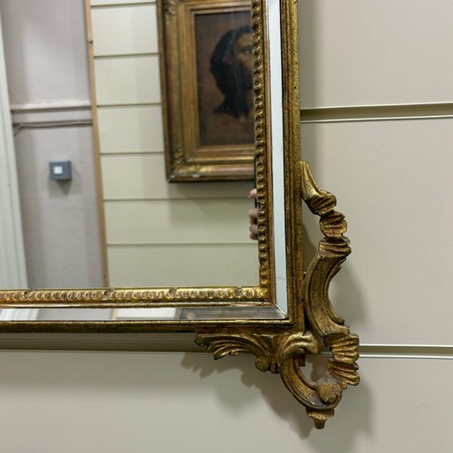 416 - A 19th century gilt-wood carved Rococo style Pier mirror, height 98cm