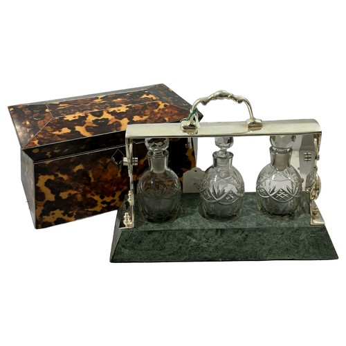 378 - A cut-glass and silver plate 3-bottle liqueur tantalus, on green marble base, length 26cm, and a rep... 