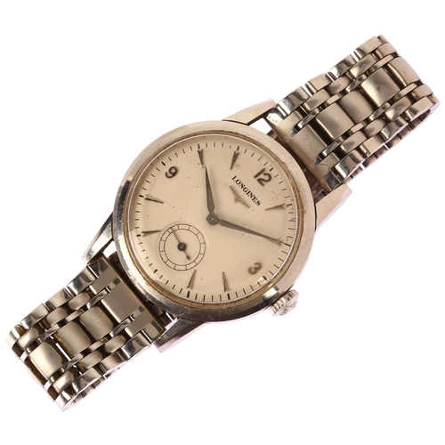 1010 - LONGINES - a Vintage stainless steel mechanical bracelet watch, circa 1960s, silvered dial with appl... 