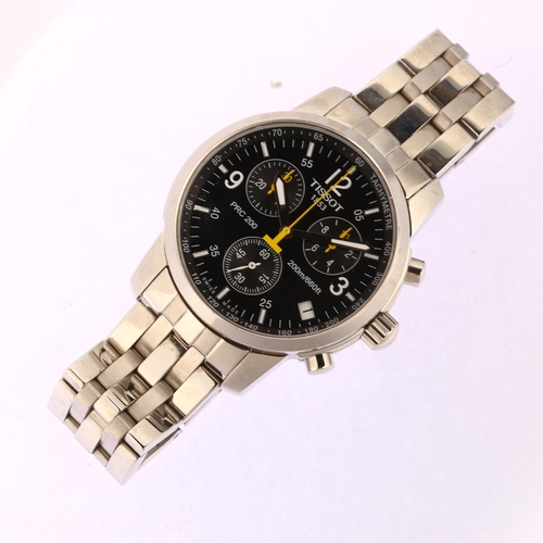 1016 - TISSOT - a stainless steel PRC 200 quartz chronograph bracelet watch, ref. T461, black dial with qua... 