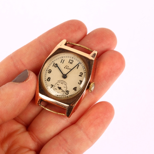 1027 - ELCO - a mid-20th century 9ct rose gold mechanical wristwatch head, circa 1940s, silvered dial with ... 