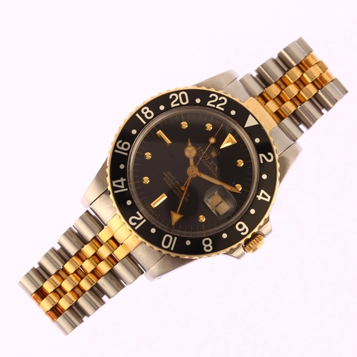 1035 - ROLEX - a bi-metal Oyster Perpetual GMT-Master automatic calendar bracelet watch, ref. 16753, circa ... 