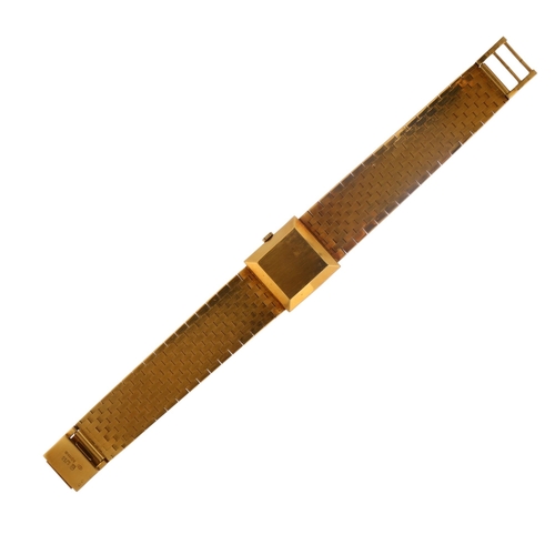 1041 - EBEL - an 18ct gold mechanical bracelet watch, ref. 878, circa 1960s, champagne dial with applied gi... 