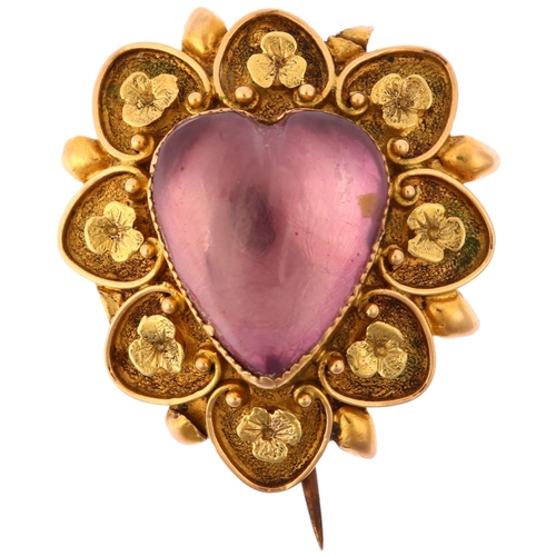 1104 - A Victorian pinchbeck? foil-backed amethyst heart mourning brooch, the central heart cabochon amethy... 