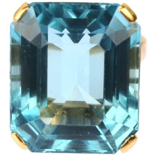 1108 - An impressive 18ct gold aquamarine cocktail ring, set with 39ct emerald step-cut aquamarine, weight ... 