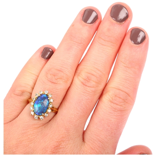 1111 - A modern 18ct gold black opal and diamond oval cluster ring, set with oval cabochon opal and modern ... 