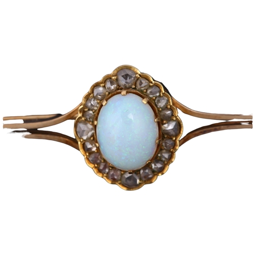 1112 - A Victorian 15ct gold opal and diamond cluster bar brooch, the central oval cluster claw set with ov... 