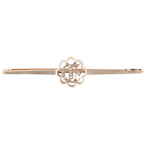 1116 - A Victorian 15ct gold enamel and diamond initial E bar brooch, circa 1880, the central openwork lobe... 