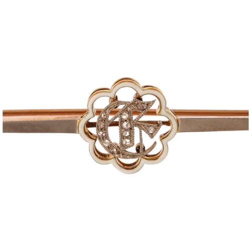 1116 - A Victorian 15ct gold enamel and diamond initial E bar brooch, circa 1880, the central openwork lobe... 