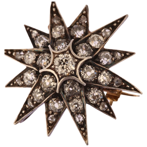 1117 - A Victorian diamond starburst brooch, circa 1880, the unmarked gold and silver frame set with old an... 