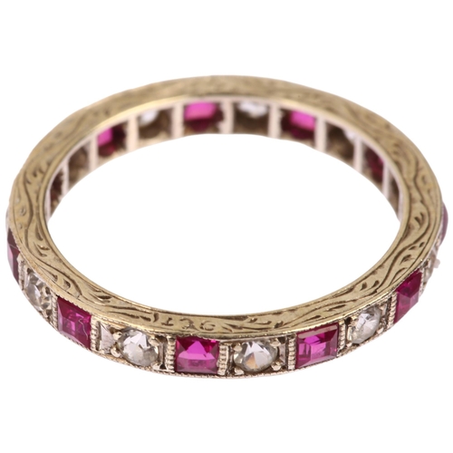 1133 - An Art Deco 9ct white gold ruby and paste full eternity ring, set with calibre-cut rubies and round-... 