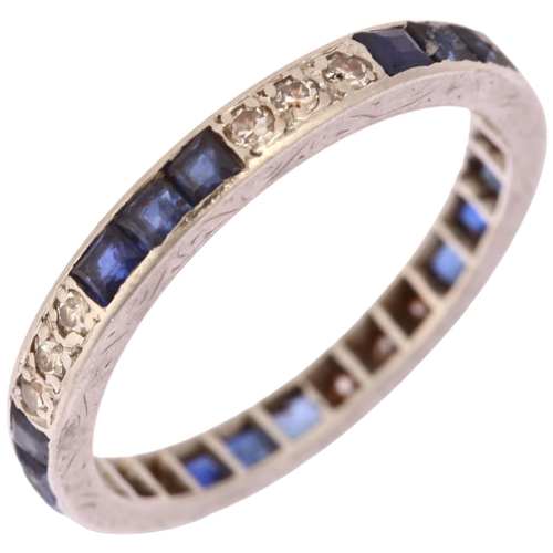 1135 - An Art Deco sapphire and diamond full eternity ring, unmarked white metal settings with calibre-cut ... 