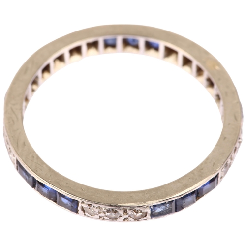 1135 - An Art Deco sapphire and diamond full eternity ring, unmarked white metal settings with calibre-cut ... 