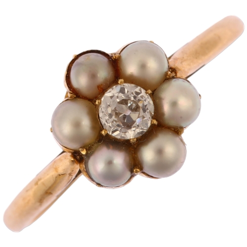 1138 - A mid-20th century pearl and diamond flowerhead cluster ring, unmarked gold settings with central 0.... 