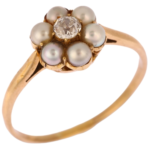 1138 - A mid-20th century pearl and diamond flowerhead cluster ring, unmarked gold settings with central 0.... 