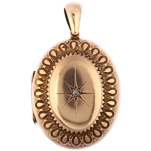 1142 - A Victorian diamond locket pendant, circa 1890, unmarked rose metal settings with central star set r... 