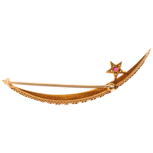 1150 - A large Victorian ruby pearl and diamond crescent moon and star brooch, circa 1900, unmarked gold se... 