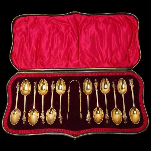 1687 - A set of 12 Victorian silver parcel-gilt Apostle teaspoons and matching sugar tongs, Wakely & Wheele... 