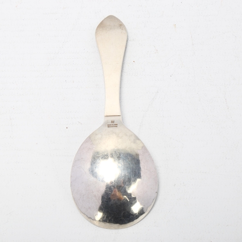 1694 - GEORG JENSEN - a Danish stylised sterling silver Antik/Continental tea caddy spoon, circa 1927, plan... 