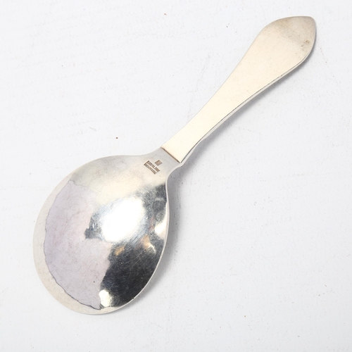 1694 - GEORG JENSEN - a Danish stylised sterling silver Antik/Continental tea caddy spoon, circa 1927, plan... 