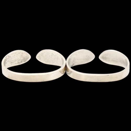 1695 - HANS HANSEN - a pair of Danish modernist sterling torque napkin rings, 5.5cm, 1.8oz total