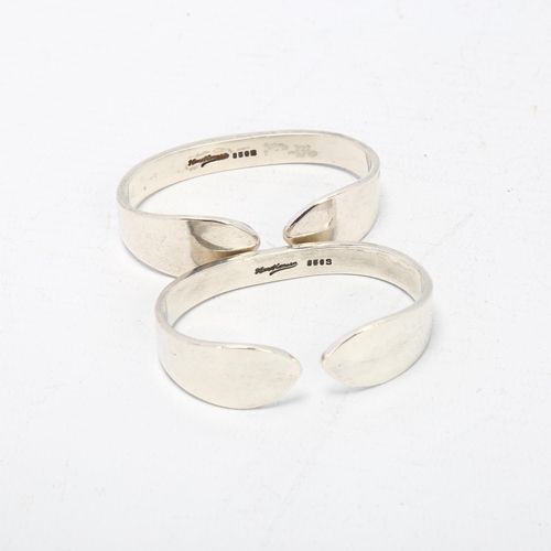 1695 - HANS HANSEN - a pair of Danish modernist sterling torque napkin rings, 5.5cm, 1.8oz total