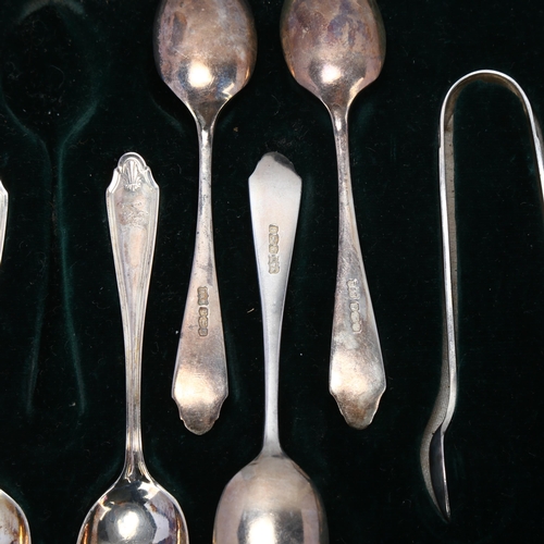 1703 - A cased set of 11 George V silver teaspoons and matching sugar tongs, Mappin & Webb Ltd, Sheffield 1... 