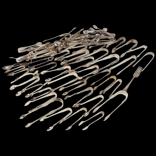 1706 - A large quantity of silver sugar tongs, including George III, Victorian etc, some unmarked, 47oz tot... 