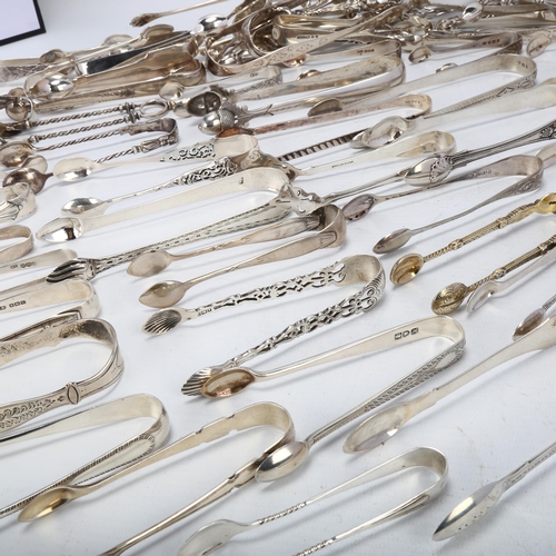 1706 - A large quantity of silver sugar tongs, including George III, Victorian etc, some unmarked, 47oz tot... 