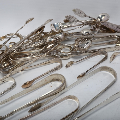 1706 - A large quantity of silver sugar tongs, including George III, Victorian etc, some unmarked, 47oz tot... 