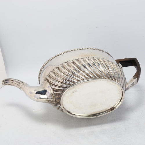 1745 - A late Victorian silver teapot, Harrison Brothers & Howson, Sheffield 1891, oval form with relief em... 