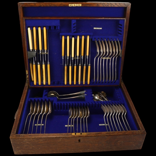 1756 - A George V oak part canteen of silver Rattail pattern cutlery, William Hutton & Sons Ltd, Sheffield ... 