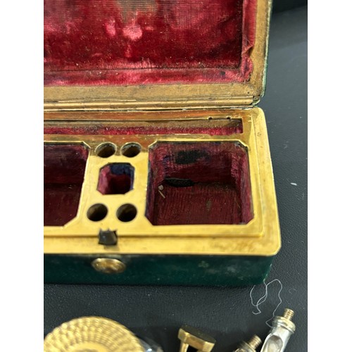 293 - An 18th century miniature green stained shagreen covered travelling inkwell, the original fitted int... 