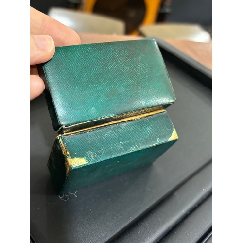 293 - An 18th century miniature green stained shagreen covered travelling inkwell, the original fitted int... 