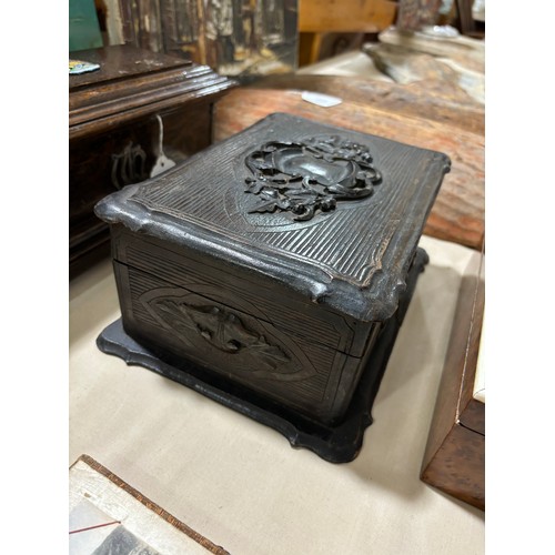 376 - A 19th century Black Forest lady's travelling box, relief carved wood, the interior fully fitted wit... 