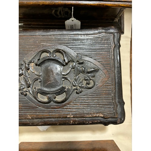 376 - A 19th century Black Forest lady's travelling box, relief carved wood, the interior fully fitted wit... 