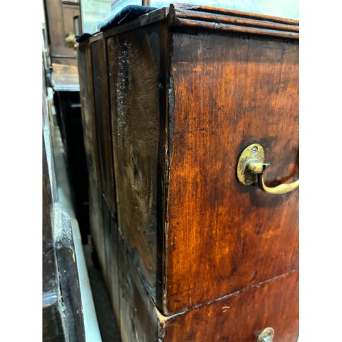 133 - An unusually small 19th century mahogany military chest of 4 long drawers in 2 parts, with recessed ... 