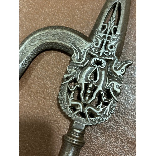 109 - 19th century Indian steel ankus or elephant goad, pierced and engraved blade with bronze finial in t... 