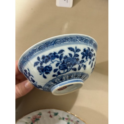 236 - A Chinese blue and white porcelain rice bowl, with pomegranate design, seal mark under base and Spin... 