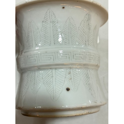 249 - A Chinese white glaze porcelain brush pot, with incised leaf decoration, on hardwood stand, height e... 