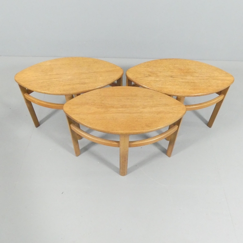 2015 - NATHAN FURNITURE - A mid-century teak circular glass-top Trinity coffee table with three oval nestin... 