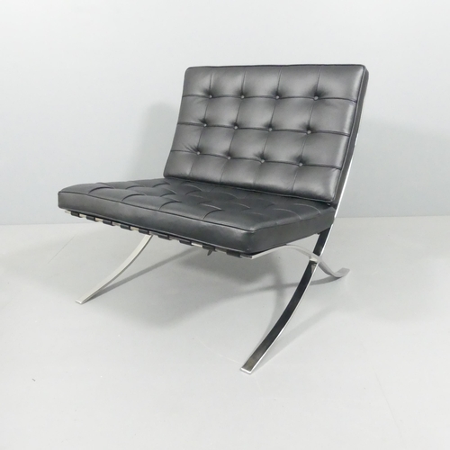 2017 - A black leather Barcelona lounge chair in the manner of Mies Van der Rohe. Overall 77x80x76cm, seat ... 