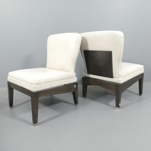 2025 - A pair of high end contemporary design slipper chairs in patterned leather with chrome detailing, wi... 