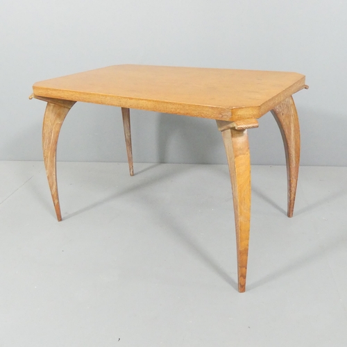 2030 - A French Art Deco oak spider leg coffee table. 76x50x47cm.