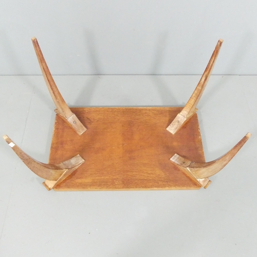 2030 - A French Art Deco oak spider leg coffee table. 76x50x47cm.