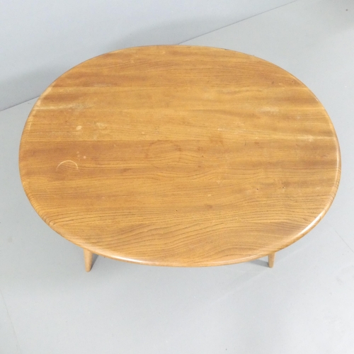 2031 - ERCOL - an elm model 454 oval two-tier coffee table. 100x44x83cm