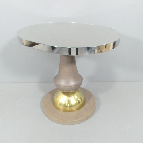 2033 - A contemporary design chrome banded table with decanter shaped pedestal stem on brass dome in the ma... 