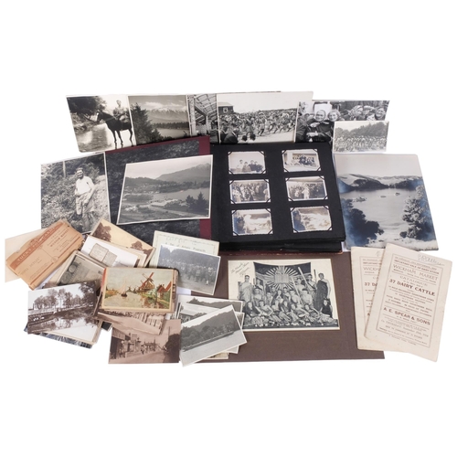 104 - A collection of early 20th century photographs, including scenes from Queenstown and Lake Wakatipu i... 