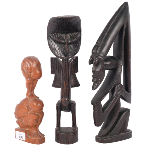 106 - A carved African Ashanti figure, H33cm, and 2 other carved hardwood figures (3)